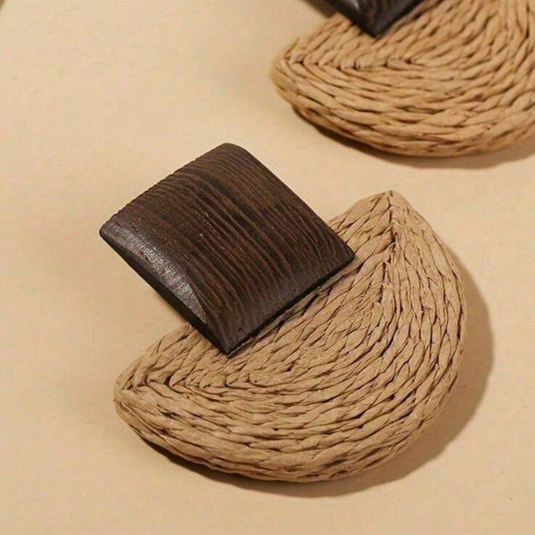 Woven beige coasters with a dark brown square center on a beige background