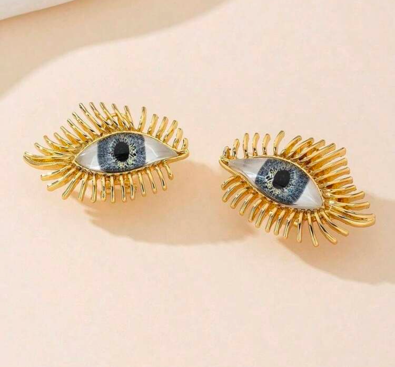 Gold Eye Statement Earrings